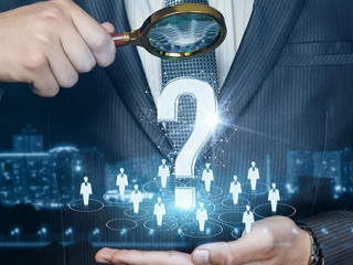 Anzugtraeger-Lupe-Fragezeichen-286358041-AS-natali-mis