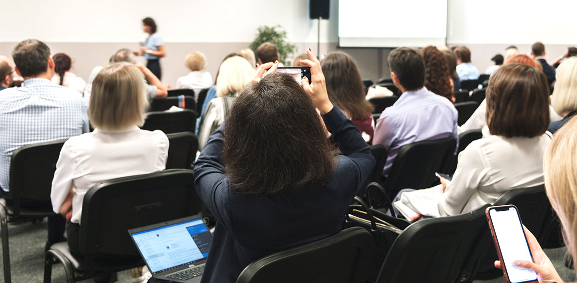 Business woman and people Listening on The Conference. Horizontal Image
