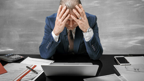 Portrait of desperate businessman in big trouble feeling lost
