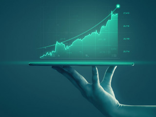 Businessman holding tablet and showing holographic graphs and st