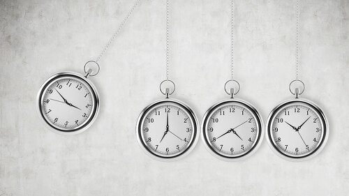 A pocket watch as a swing of the pendulum. Concrete background. 3D rendering. Time is money concept.