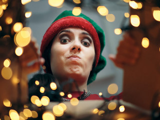 Disappointed Christmas Woman Looking Inside Cardboard Gift Box