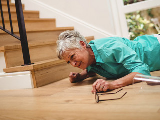 Senior woman fallen down from stairs