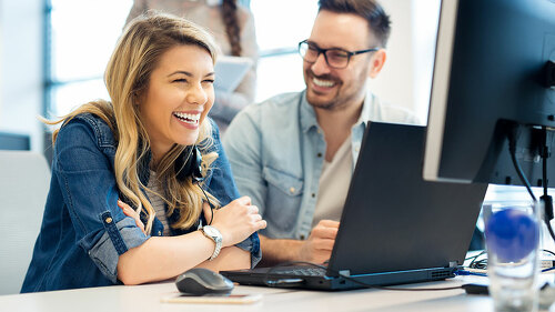 Group of business people and software developers working as a te