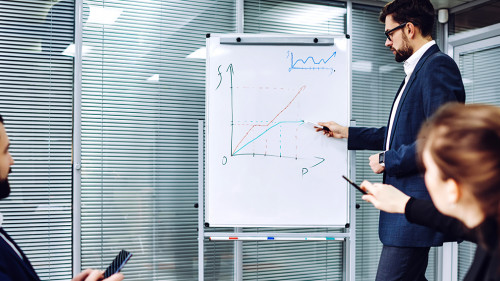 Crew of male and female caucasian employees having conversation