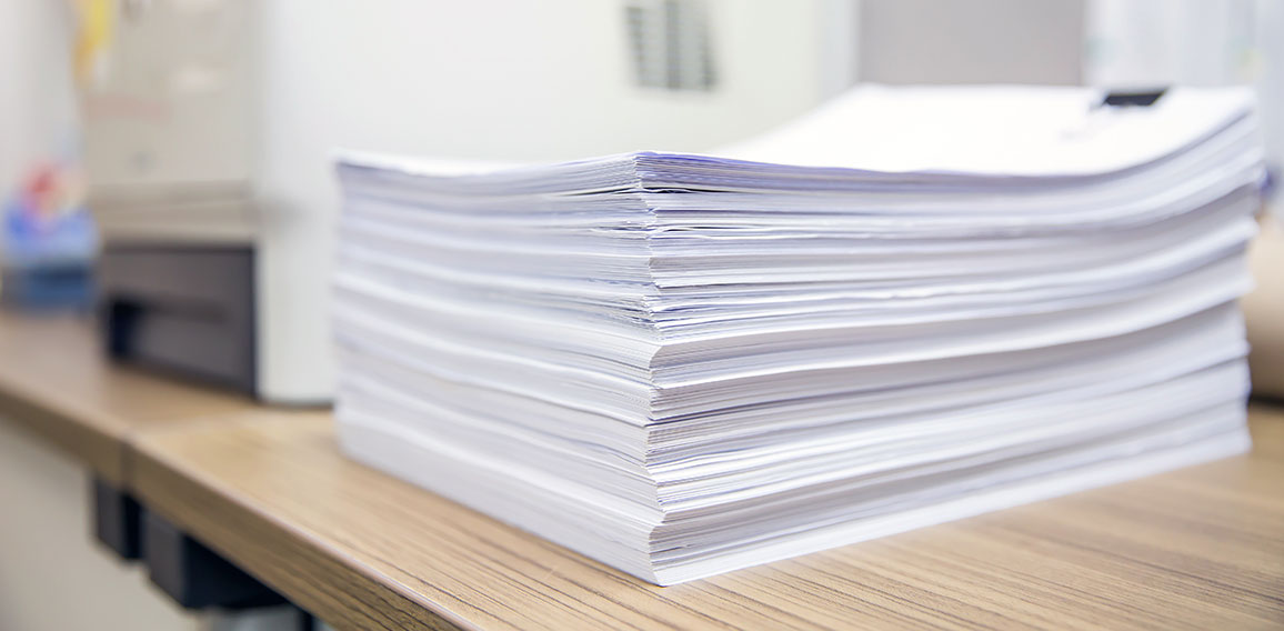 Pile of a lots reuse paper and paperwork report or printout docu