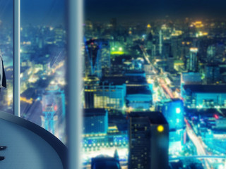 Businessman staying infront of city view