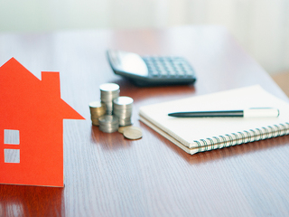 Buying and selling houses and real estate prices. Concept. Man u