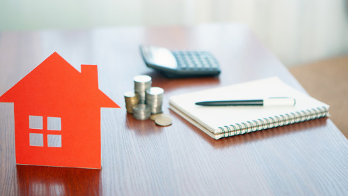 Buying and selling houses and real estate prices. Concept. Man u