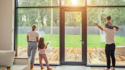 Parents with children near big Panoramic Window garden View