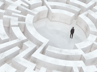 businessman in the middle of a maze