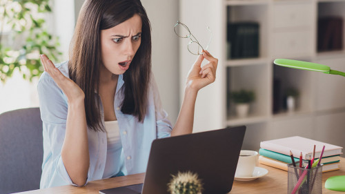 Photo of anxious mad girl take off glasses unexpected problem wear eyeglasses shirt in home office indoors