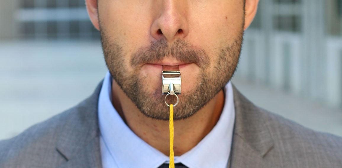 Businessman blowing a white isolated