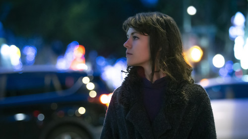 Woman Walking At Night in the City