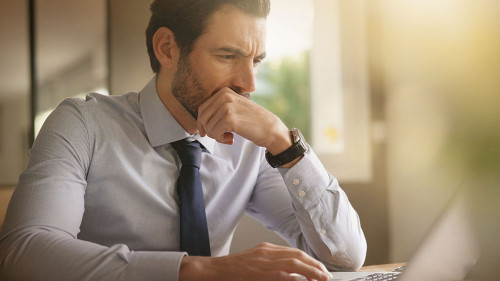 boss in home confinement working on his laptop