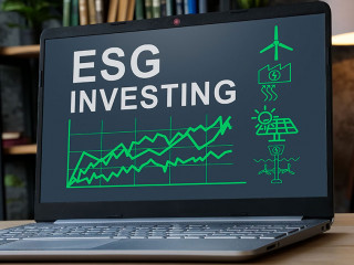 ESG investing results on the laptop screen.