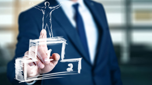 man hand winner on podium