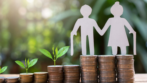 old couple model standing on money coins saving for concept inve