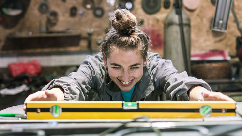 young woman working in a workshop
