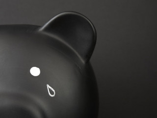 Black Piggy Bank with tear