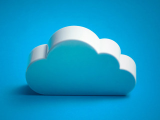 White cloud shape over blue background