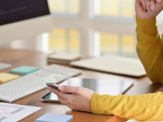 UI creative designer designing wireframe layout for responsive mobile smartphone application