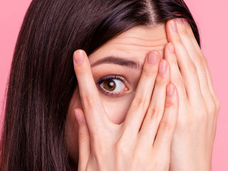 Close-up portrait of her she nice-looking attractive charming lovely confused worried puzzled straight-haired lady closing face palms isolated over pink pastel background