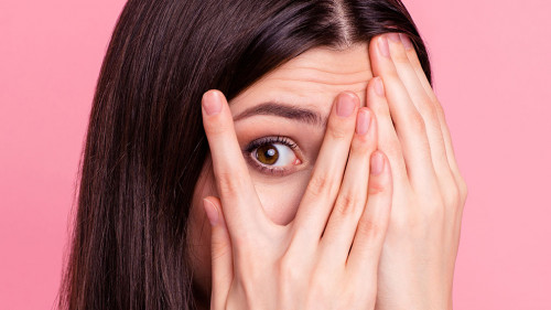 Close-up portrait of her she nice-looking attractive charming lovely confused worried puzzled straight-haired lady closing face palms isolated over pink pastel background