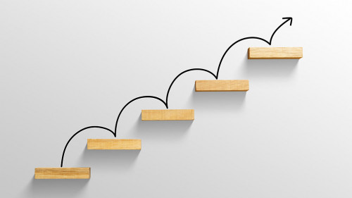 rising arrow on staircase, increasing business