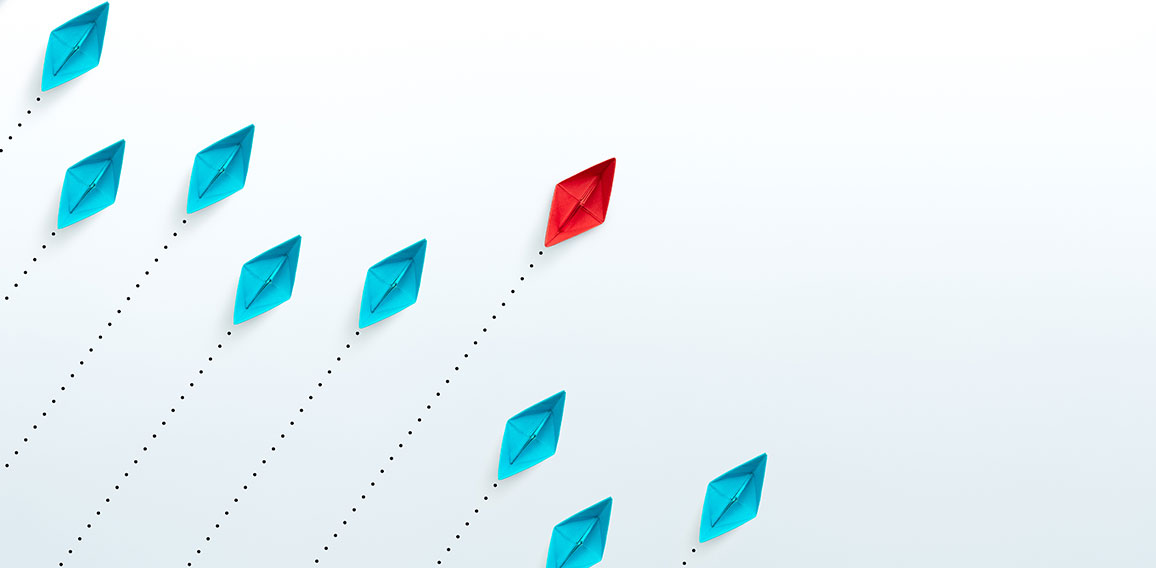 Business competition and leadership concepts with paper ships on