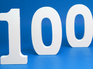 One Hundred ( 100 ) Percentage Isolated Red Background with Co