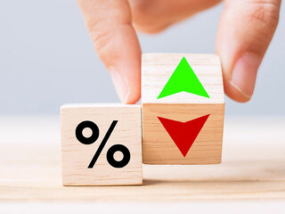 business man Hand change wood cube block with percentage to UP a