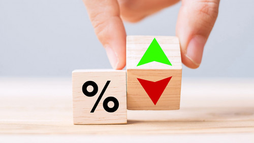 business man Hand change wood cube block with percentage to UP a