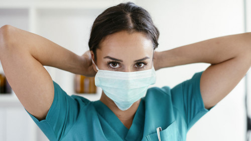 Young female doctor in medical office. Beautiful female doctor p