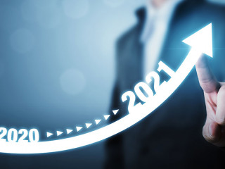 Businessman pointing arrow graph corporate future growth plan. Business development to success and growing growth year 2020 to 2021 concept