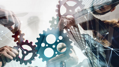 Business team connect pieces of gears. Teamwork, partnership and integration concept. double exposure with network effects