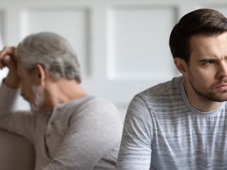 Mature father and adult son have family conflict