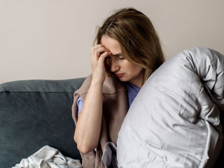 young woman with long covid syndrome - painful condition, headac