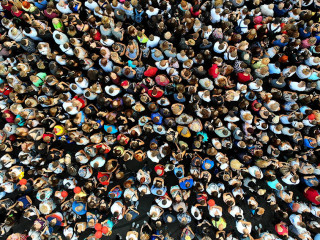 People crowd texture background. Top view from drone.