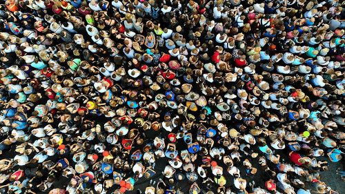 People crowd texture background. Top view from drone.
