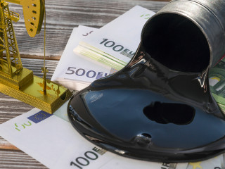 Concept of gold oil drilling a pump, spilled oil from a barrel o