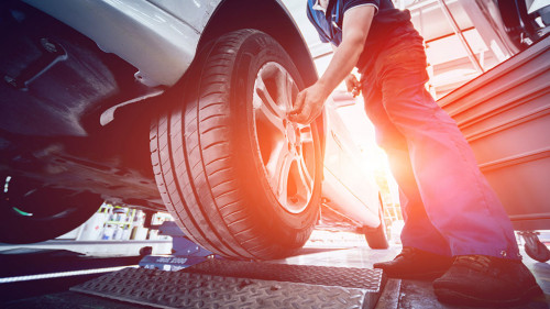 Automotive suspension test and brake test rolls in a auto repair service.