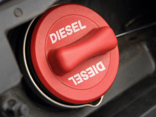a red fuel cap with the inscription "Diesel"