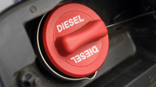 a red fuel cap with the inscription "Diesel"
