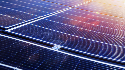 Renewable energy system with solar panel for electricity and hot water