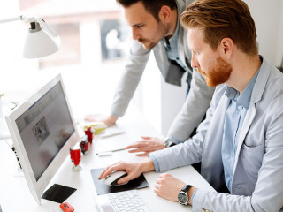 Coworkers planning startup goals