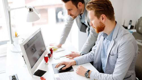 Coworkers planning startup goals