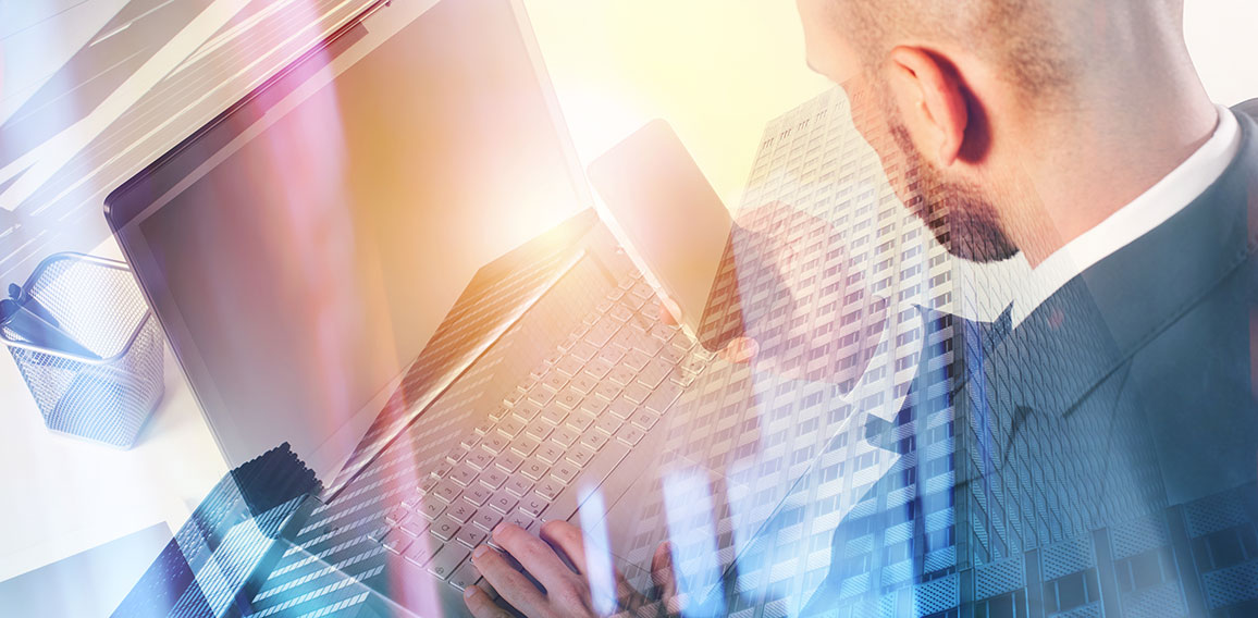 Businessperson in office connected on internet network with laptop