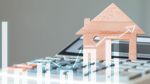 House Miniature model on calculator with over digital chart repo