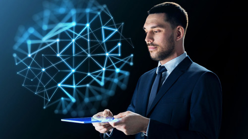 businessman with tablet pc and network projection